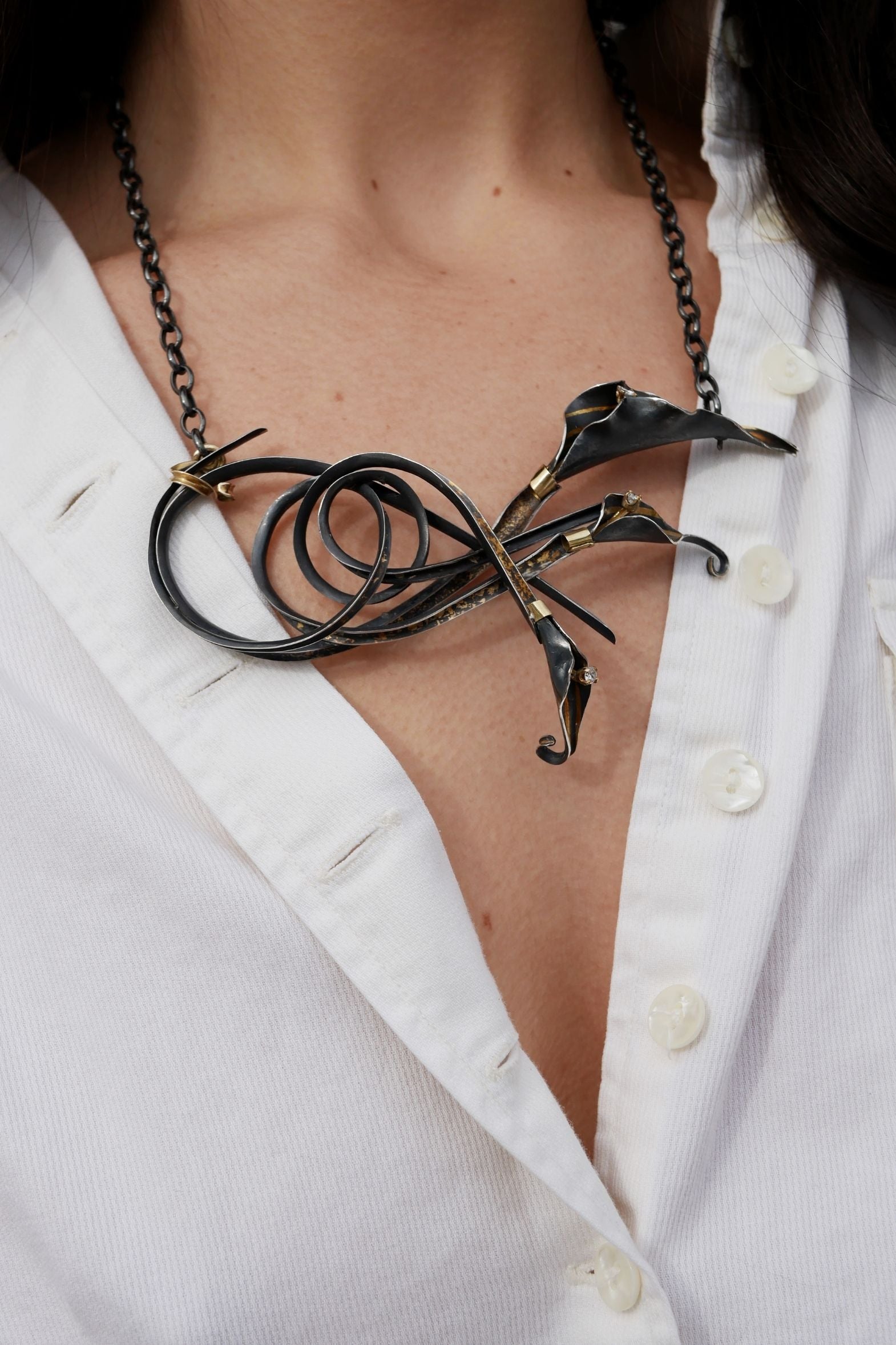 Hand-raised Lily Necklaces